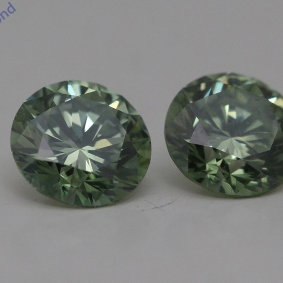 A Pair Of Round Loose Diamonds 0.92 Ct Green Vs1 C49004139